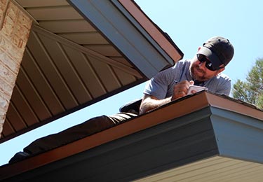 Sellers Home Inspection in El Paso — Paul Egger from EGR Solutions inspecting a roof.